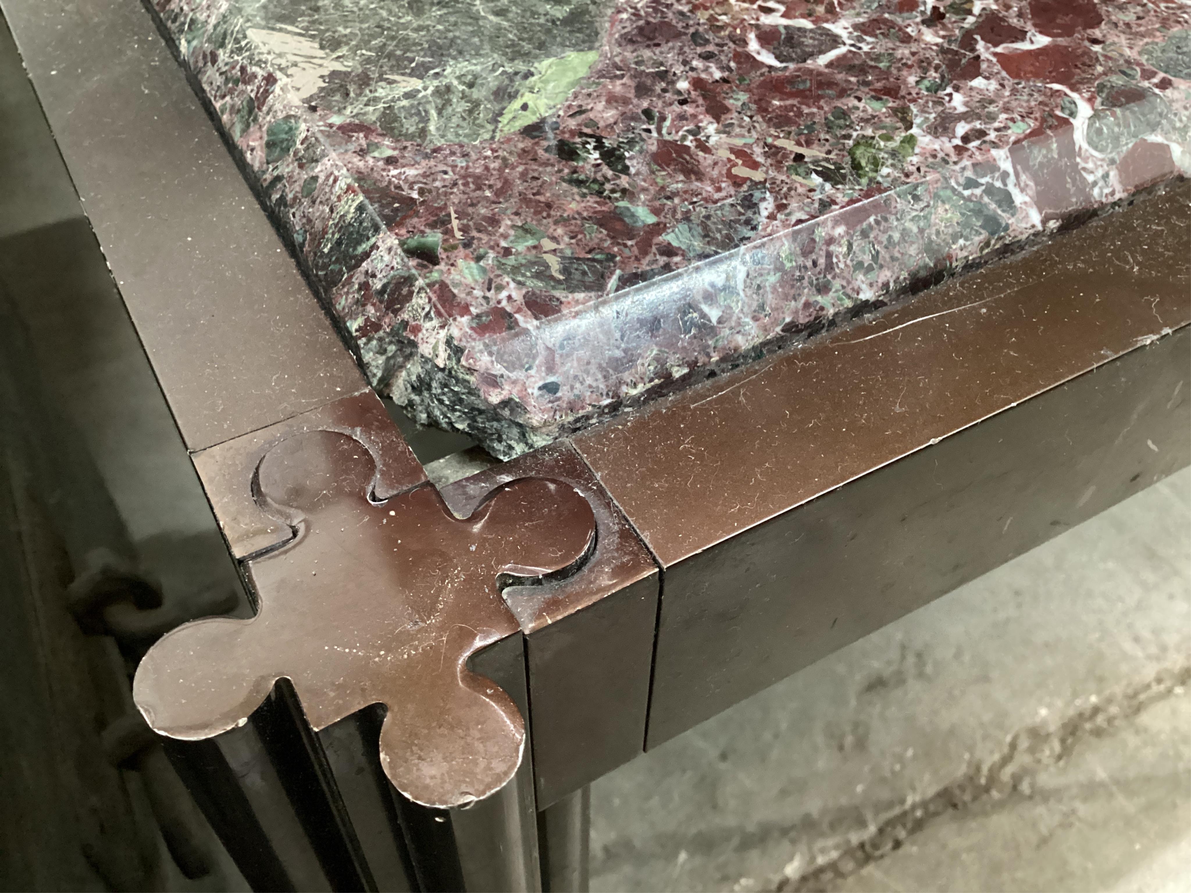 A Contemporary square marble topped brass coffee table, 110cm, height 39cm, Provenance: The late Kenneth Turner (1936-2025), celebrity florist, designer and perfume retailer, he received the Royal Warrant from the Prince